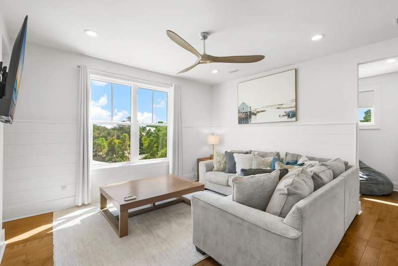 Third floor features the perfect living room & gaming space.