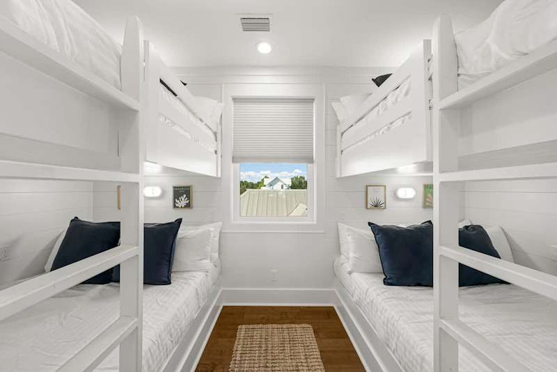 Bedroom #5 features 2 queen/queen bunk beds.