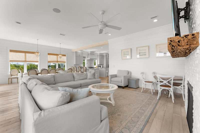 Luxurious open floor living space makes it easy to host large groups with views of the Gulf.