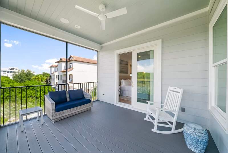 Screened in patio off bedroom.