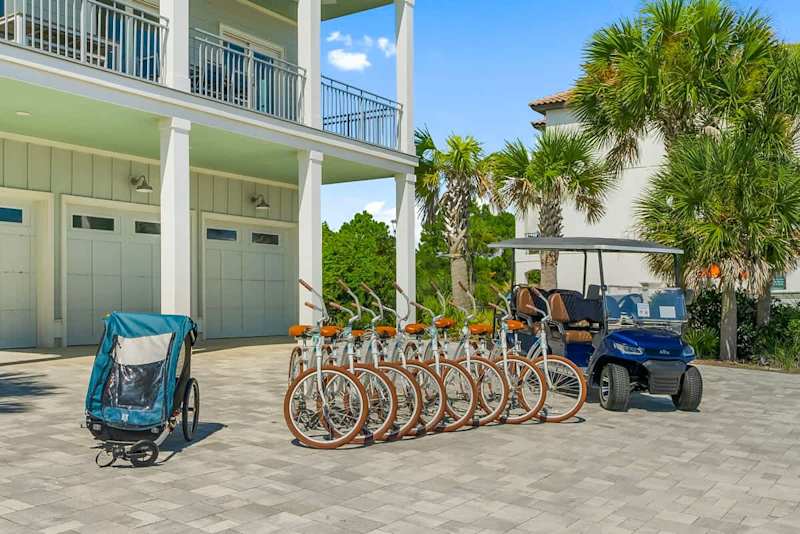 Golf cart + 8 bikes included.