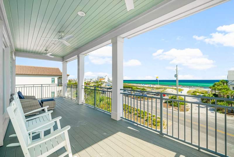 Large covered porch off of bedrooms #5 and #6, perfect for morning coffee & relaxation while enjoying gulf views.