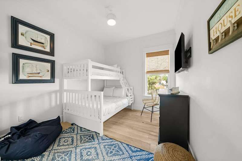 Bedroom #2 features a Twin/Full bunk bed with smart TV.