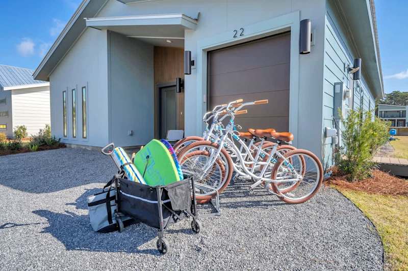 Pack light! Home includes beach gear and four adult bikes.