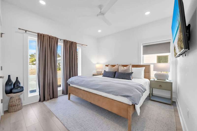 Bedroom #4 features a king bed and smart tv.
