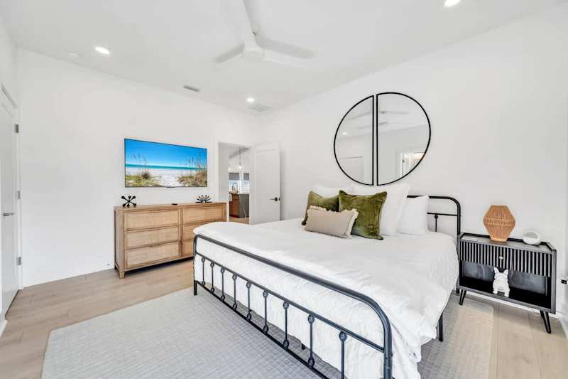 Bedroom #2 features a king bed, smart tv and ensuite.