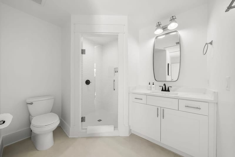 Pool house shared walk-in shower.