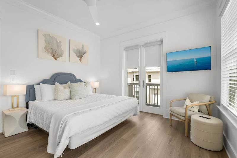 Bedroom #4 features a king bed, smart tv, access to balcony, and ensuite.