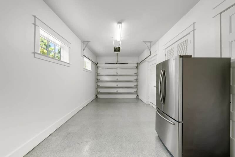 Garage access with additional fridge.