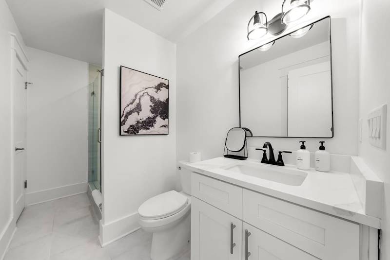 Bathroom features walk-in shower.