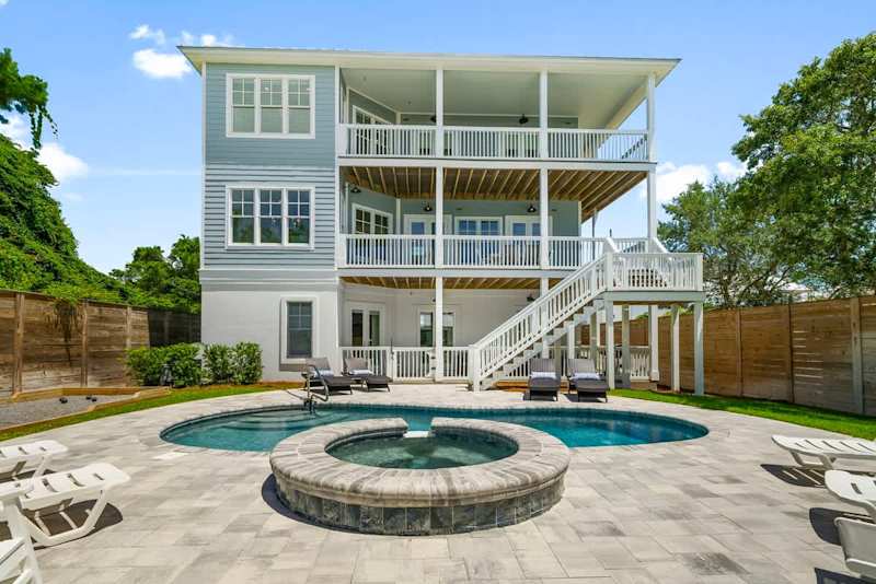 Beautiful outdoor space complete with heated pool/spa and outdoor lounging.