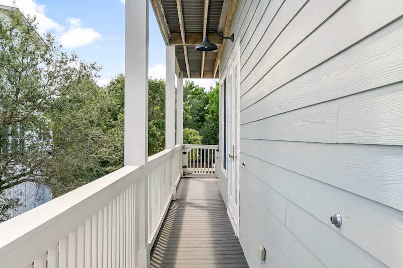 Second floor balcony offers access to a wrap around porch.