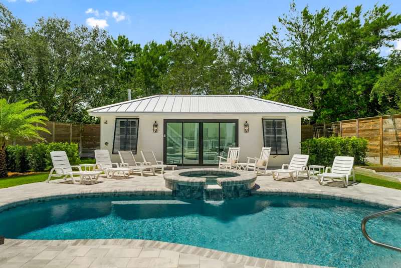 Pool house with direct access to outdoor lounging.