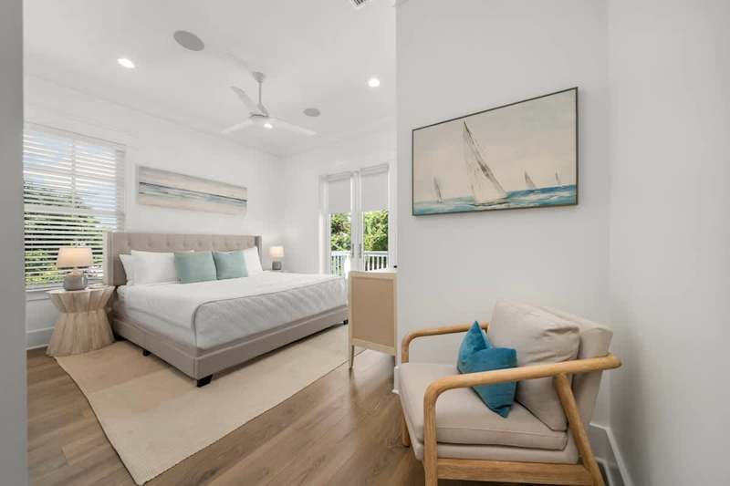 Bedroom #3 features a king bed, smart tv, access to balcony, and ensuite.