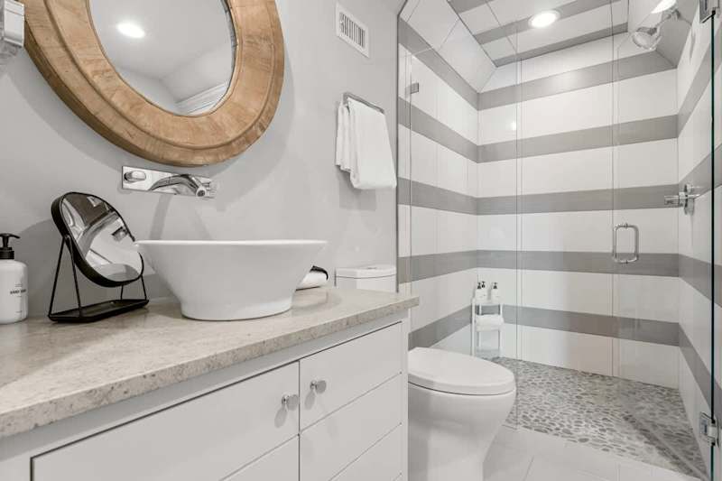 Bathroom features walk-in shower.