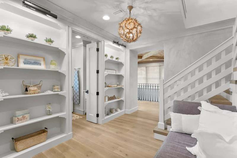 Second floor living space is perfect to read a book.