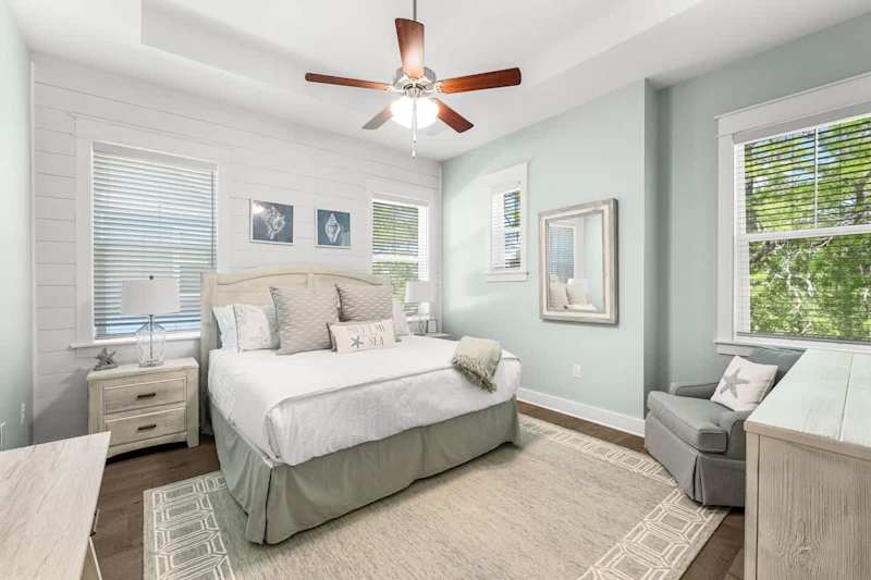 Bedroom #3 features a king bed, ensuite, and smart tv.