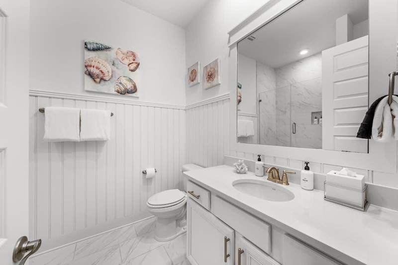 Second floor hallway bathroom features a shower/tub combo.