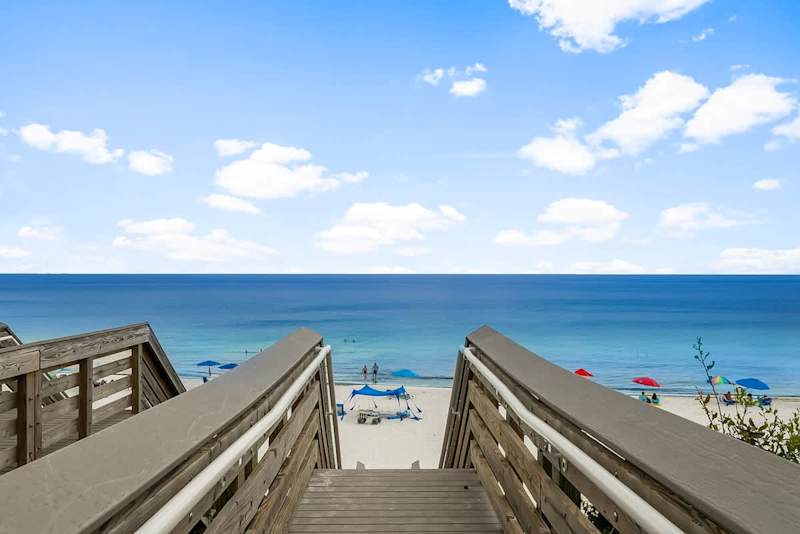 Public beach access is a short walk from the home.
