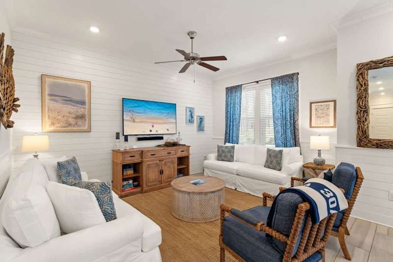 Spacious living room with seating for all.