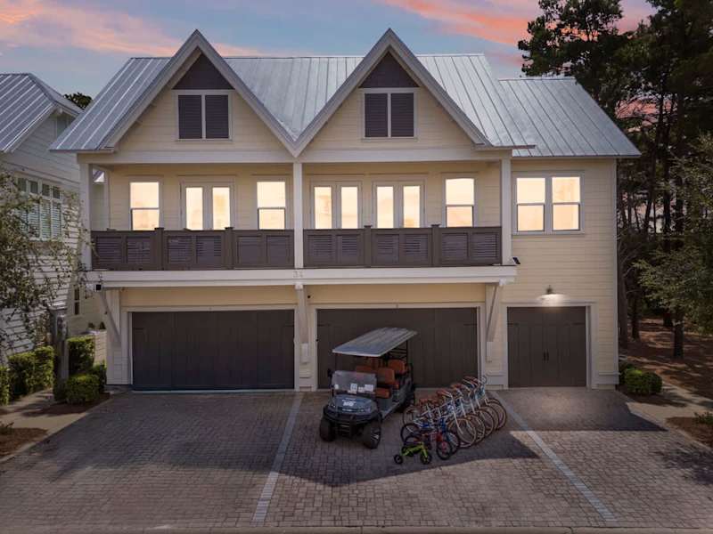 Home features a 6 seater golf cart, 6 adult bikes, and trailer!