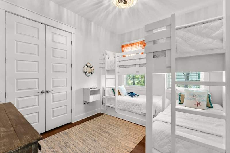 Bedroom #3 features (2) twin/twin bunks with a smart tv.