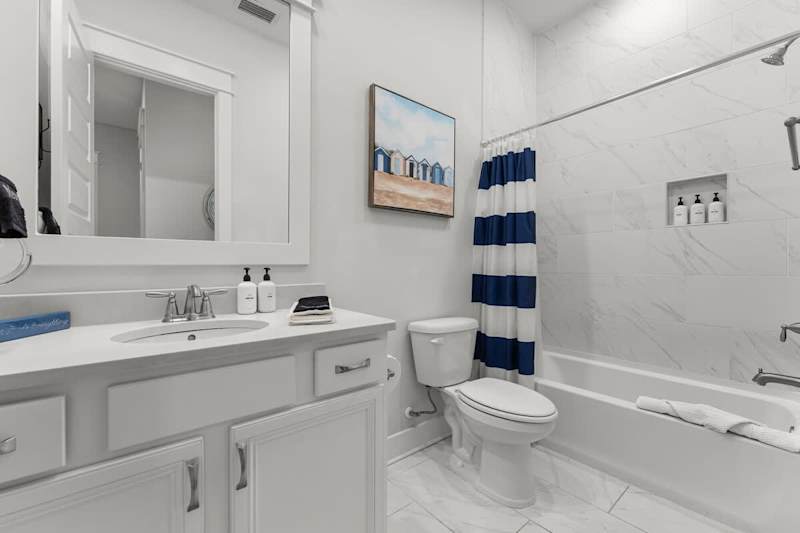 Second floor hallway bathroom features a shower/tub combo.