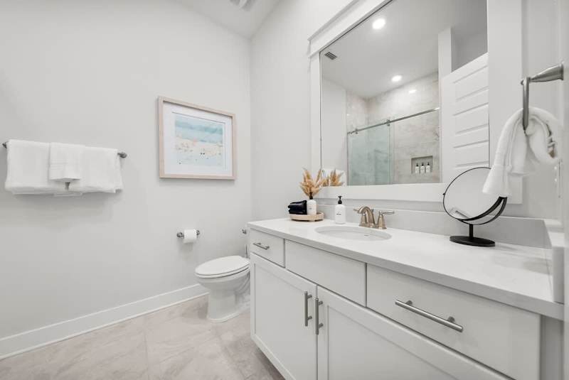 Second floor hallway bathroom features a shower/tub combo.