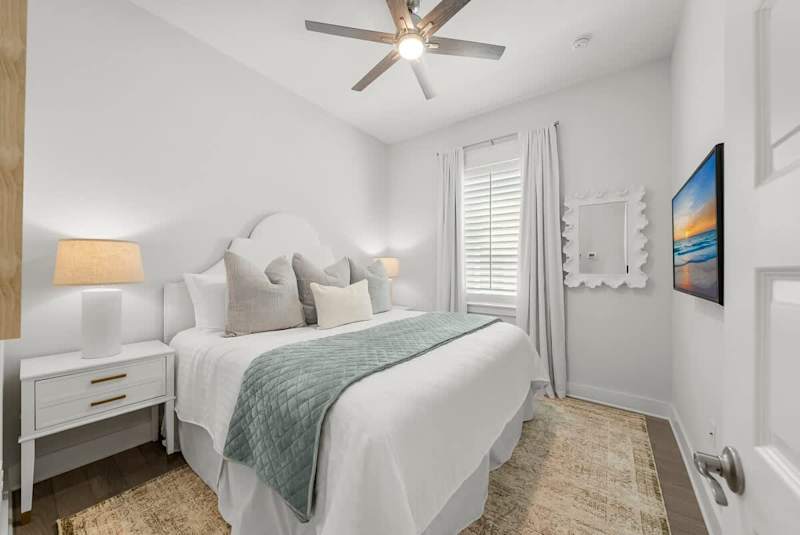 Bedroom #1 features a king bed and smart tv.