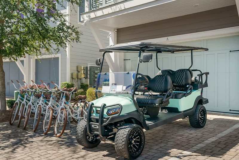 The home features a 6 seater golf cart & 6 adult bikes.