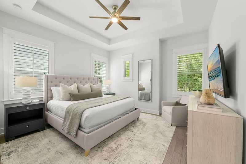 Bedroom #3 features a king bed, ensuite, and smart tv.