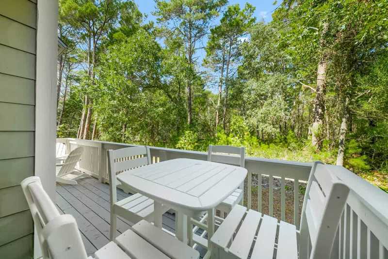 Beautiful, serene patio off living room. Perfect spot to enjoy your morning coffee!