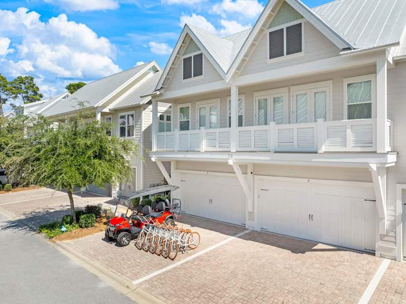 Home features a 6 seater golf cart and 6 adult bikes.