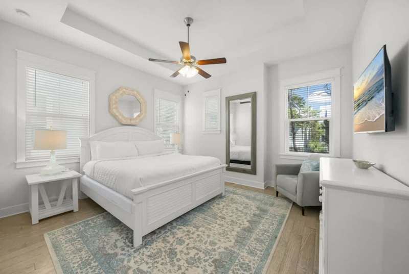 Bedroom #1 features a king bed, ensuite, and smart tv.