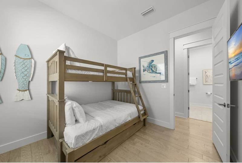Bunk room with trundle bed perfect for the kiddos.