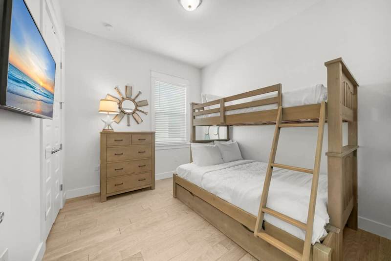 Bedroom #3 features twin/full bunk with a smart tv.