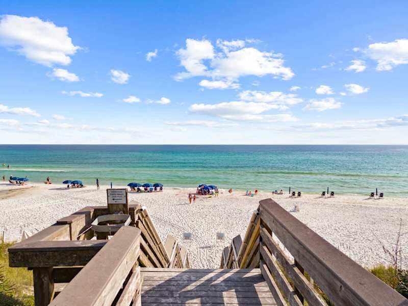 Public beach access is a short walk from the home.