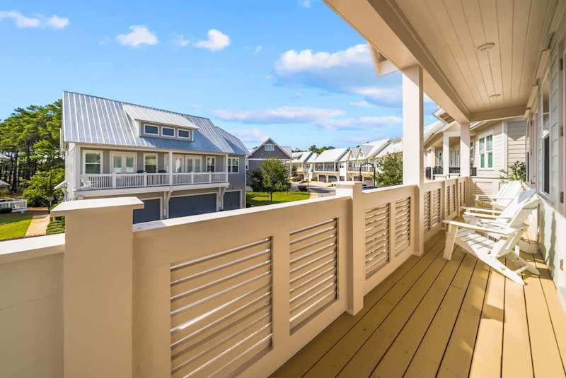 Large balcony spans across the front of the home- perfect for catching sunrise or sunset!