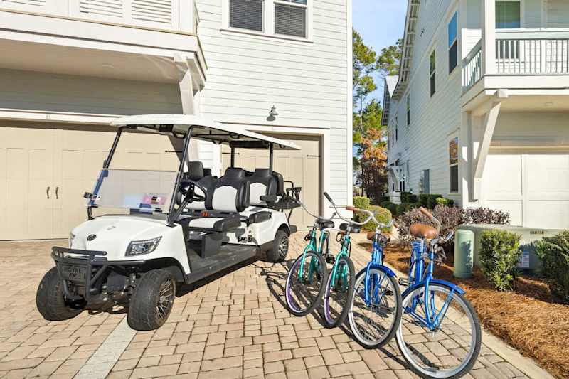 Home features a 6 seater golf cart and 4 adult bikes!