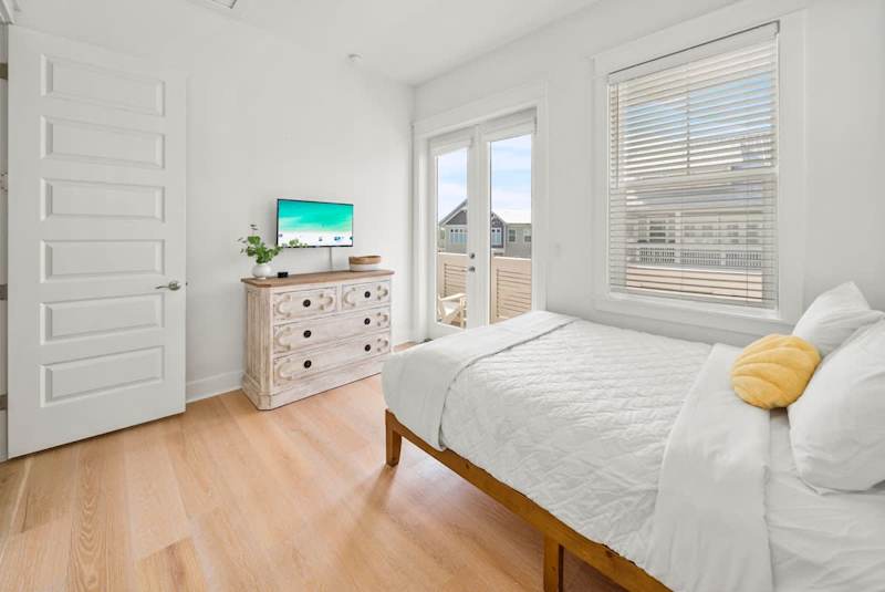 Bedroom features a smart tv.