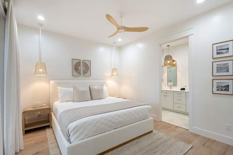 Bedroom #1 features king bed, with ensuite & large walk-in closet.
