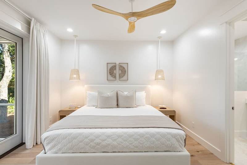 Bedroom #1 features king bed, with ensuite & large walk-in closet.