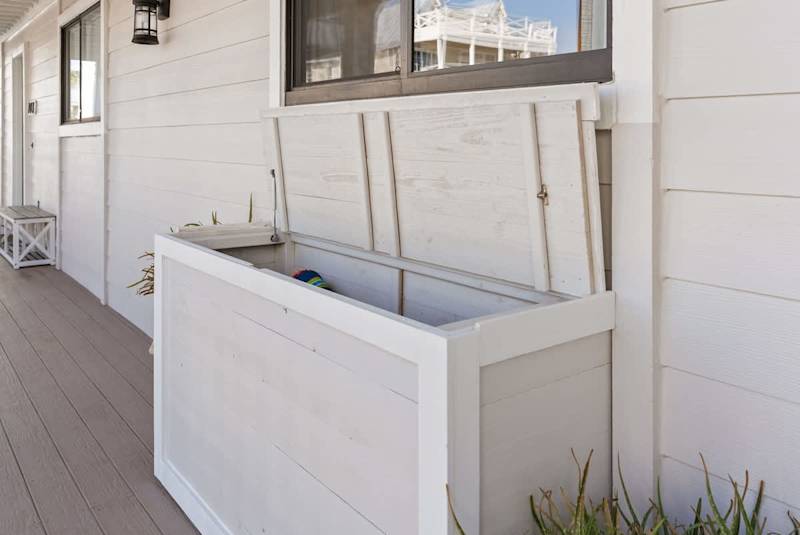 Beach box filled with beach essentials for the perfect beach day.
