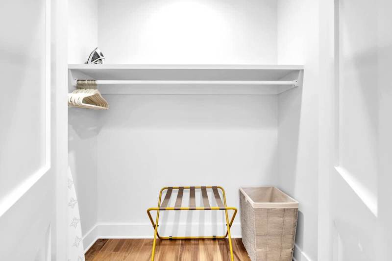 Second floor king bedroom closet space.