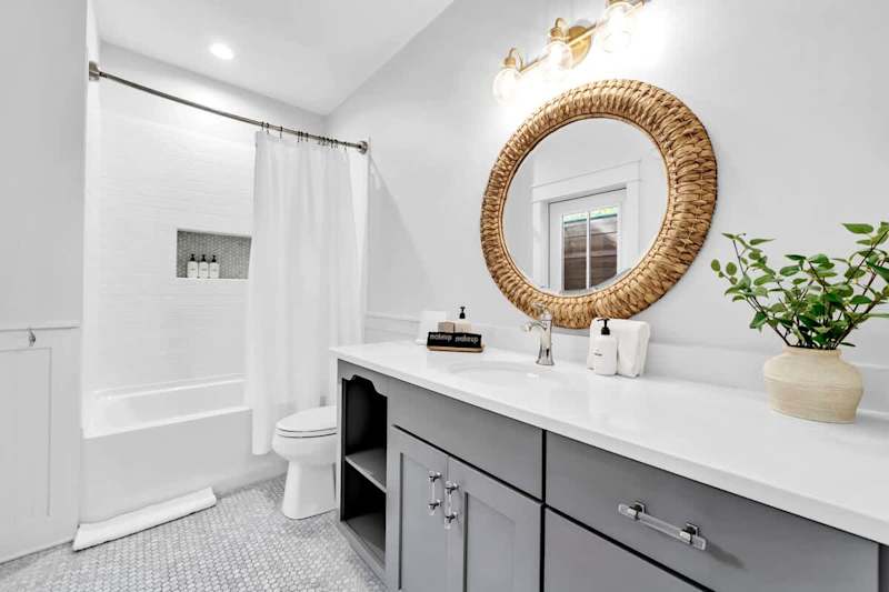 Second floor king bedroom ensuite features a shower/tub combo.