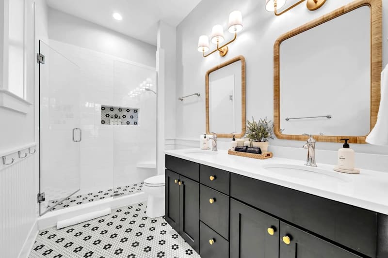 First floor king bedroom ensuite features double vanities and a walk-in shower.