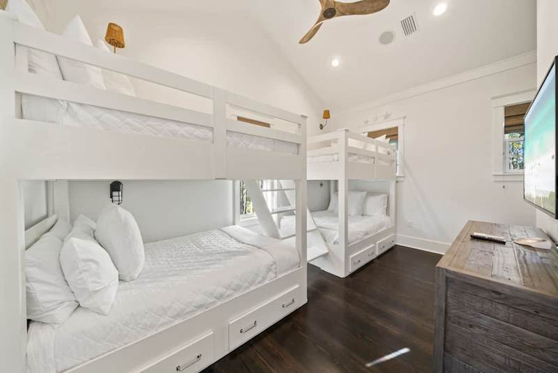 Bedroom #3 features (2) full/full bunk beds, a smart tv and ensuite.