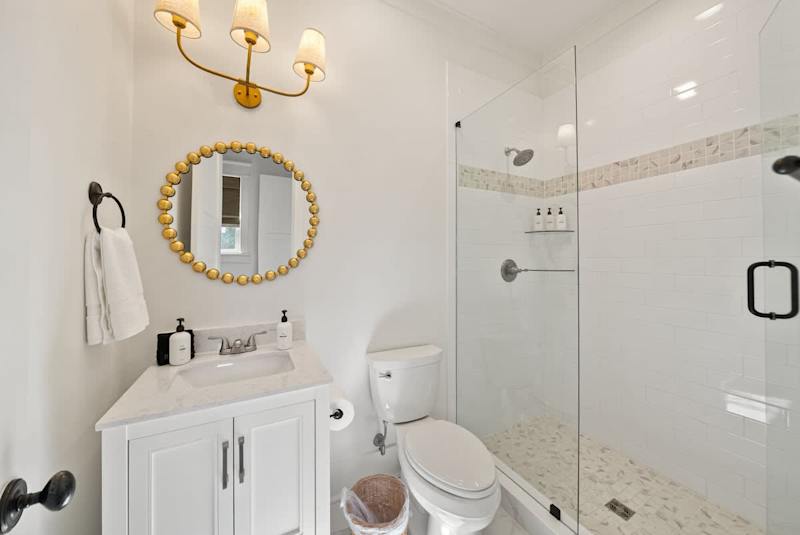 Bunk room ensuite features a walk-in shower.