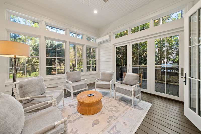 Sun room area perfect for morning coffee and games.