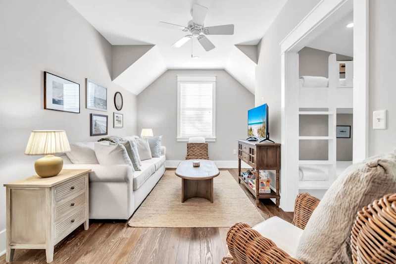 Bedroom #3 features (2) twin/twin bunks, a queen sleeper sofa, smart tv and ensuite.
